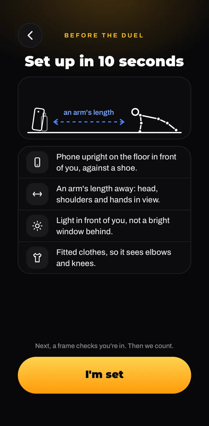 Set up in 10 seconds: phone upright on the floor against a shoe, an arm's length away, light in front of you, fitted clothes.